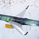 Illustration for article titled Airbrushing The Aurora Borealis On A Plane Is Mesmerizingly Beautiful